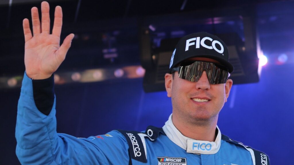 Kyle Busch waves during the driver introductions at Las Vegas Motor Speedway in 2024.